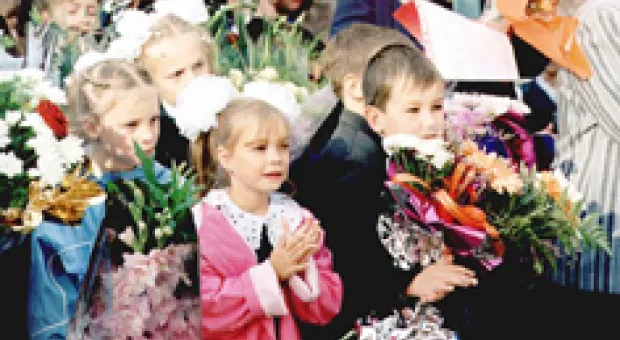 Мировые новости - Киевским первоклашкам раздают дневники с фото Тимошенко