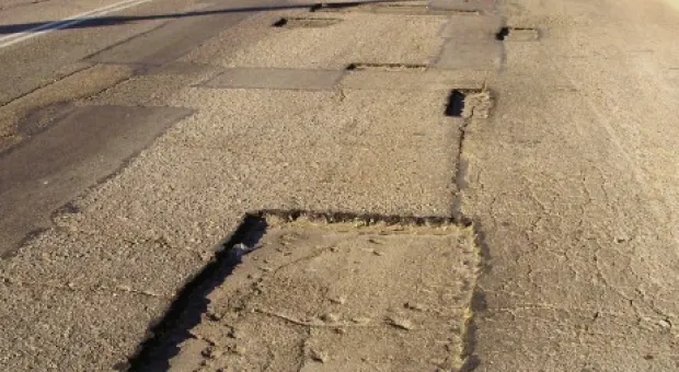 По раздолбанной дороге – в День города