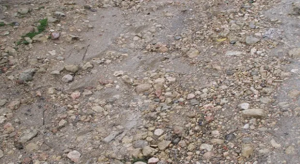 Жители улицы Полоцкая самостоятельно пытаются обустроить дорогу, но призывают власть помочь