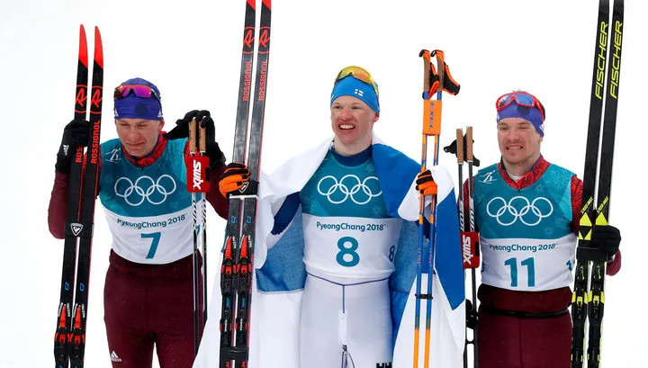 Лыжник из России Большунов завоевал серебро в масс-старте, у Ларькова - бронза