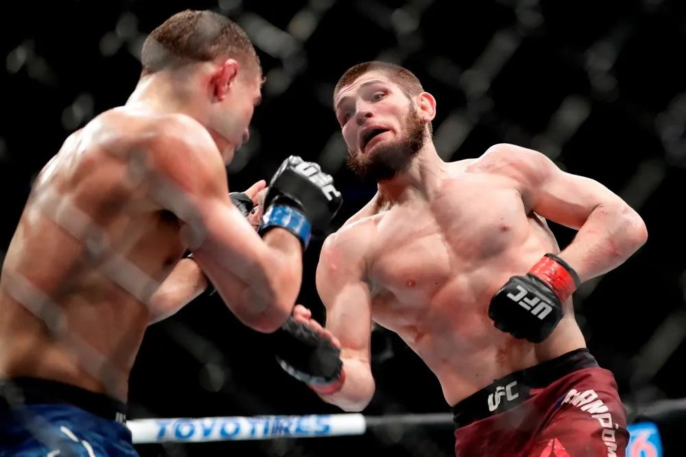 Россиянин впервые стал чемпионом UFC 