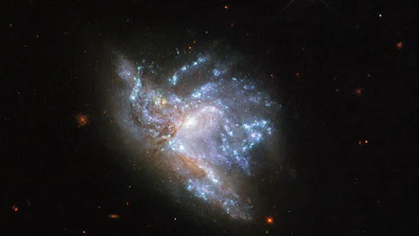 НАСА опубликовало фото столкновения двух галактик