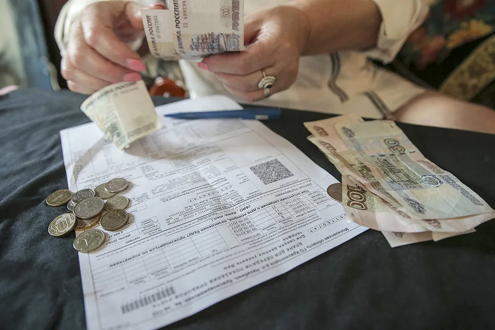 Суммы в платежках россиян уменьшатся через год