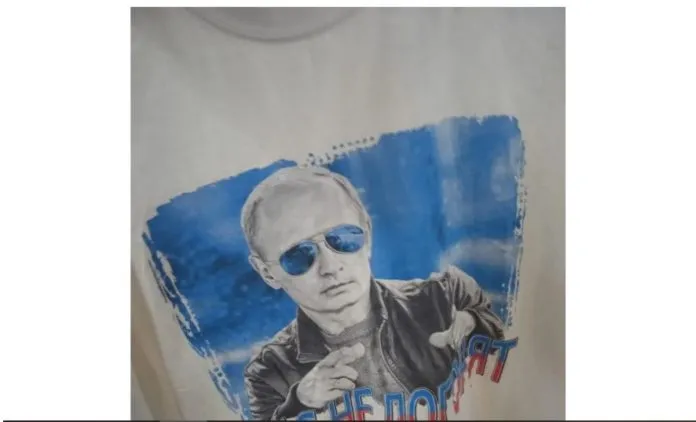 «Перемогли Путина!»: В Виннице мужчины разорвали футболку с изображением российского президента, найденную в секондхенде