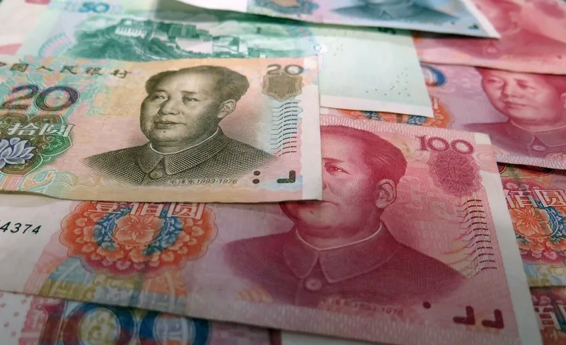 Китайцам заплатят за отказ от денег