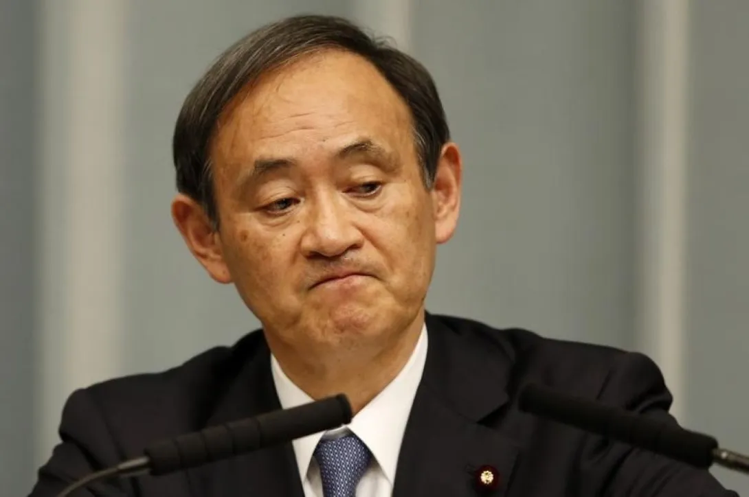 Премьер Японии извинился за ужин сына с чиновниками