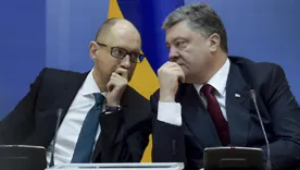 Немецкие СМИ: Арсений Яценюк и Пётр Порошенко продавали места в Верховной раде за миллионы долларов